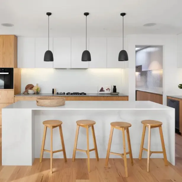 Modern white clean  kitchen with bar stools