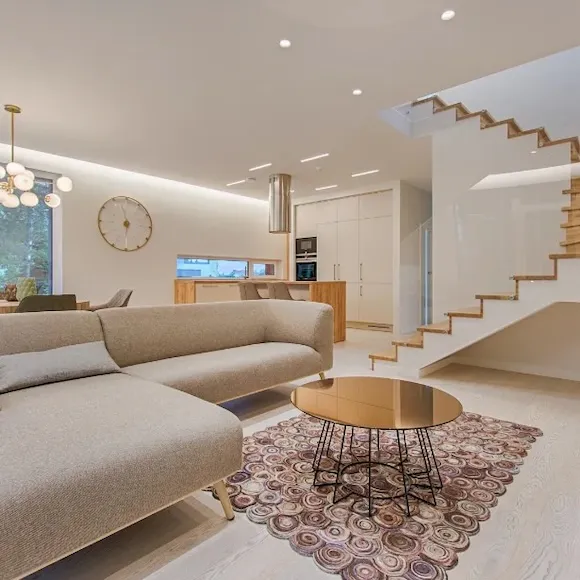 Modern clean living room with staircase